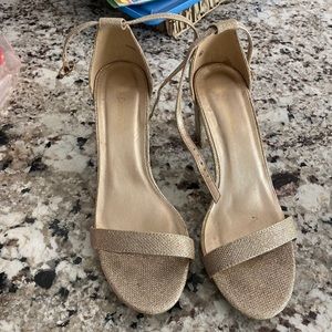 Gold strapped heels